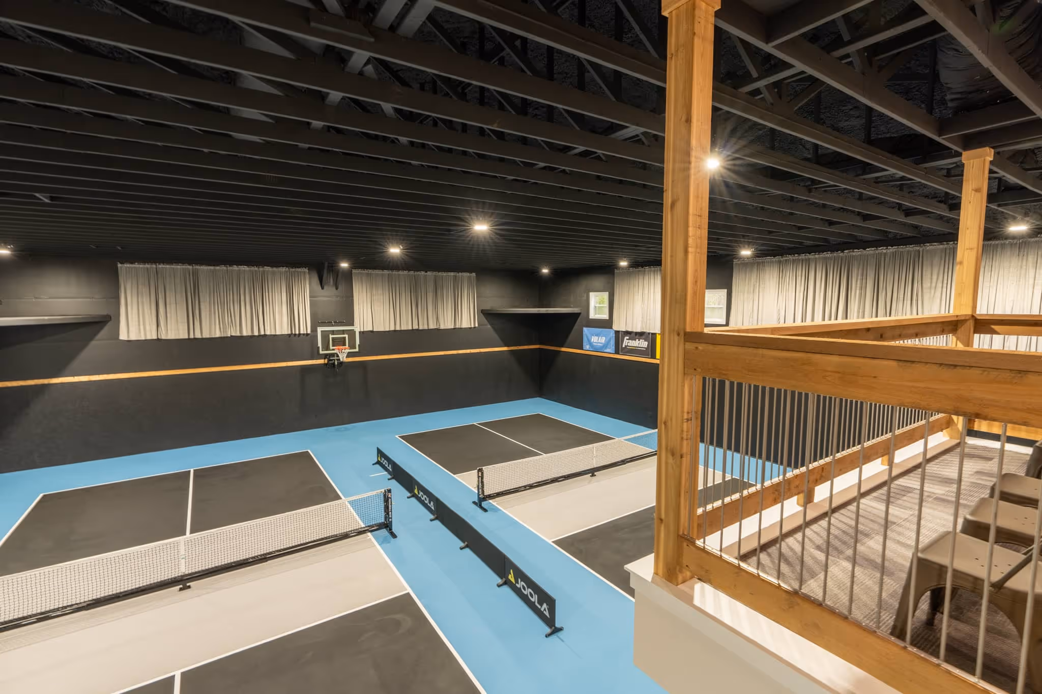 The Picklebarn ETX Airbnb pickleball courts balcony