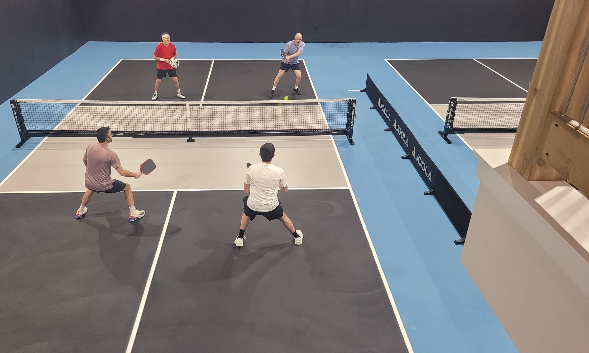People playing pickleball at The Picklebarn ETX in Chandler TX